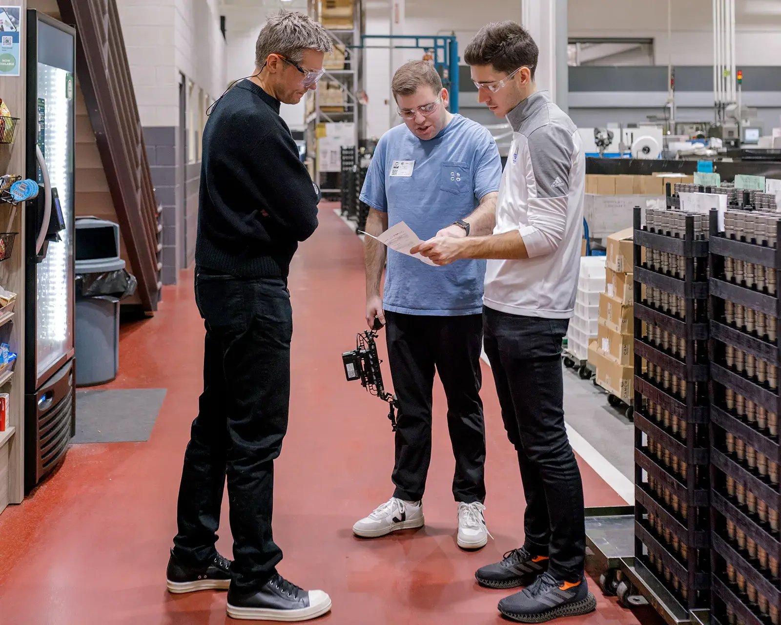 Team reviewing work in studio